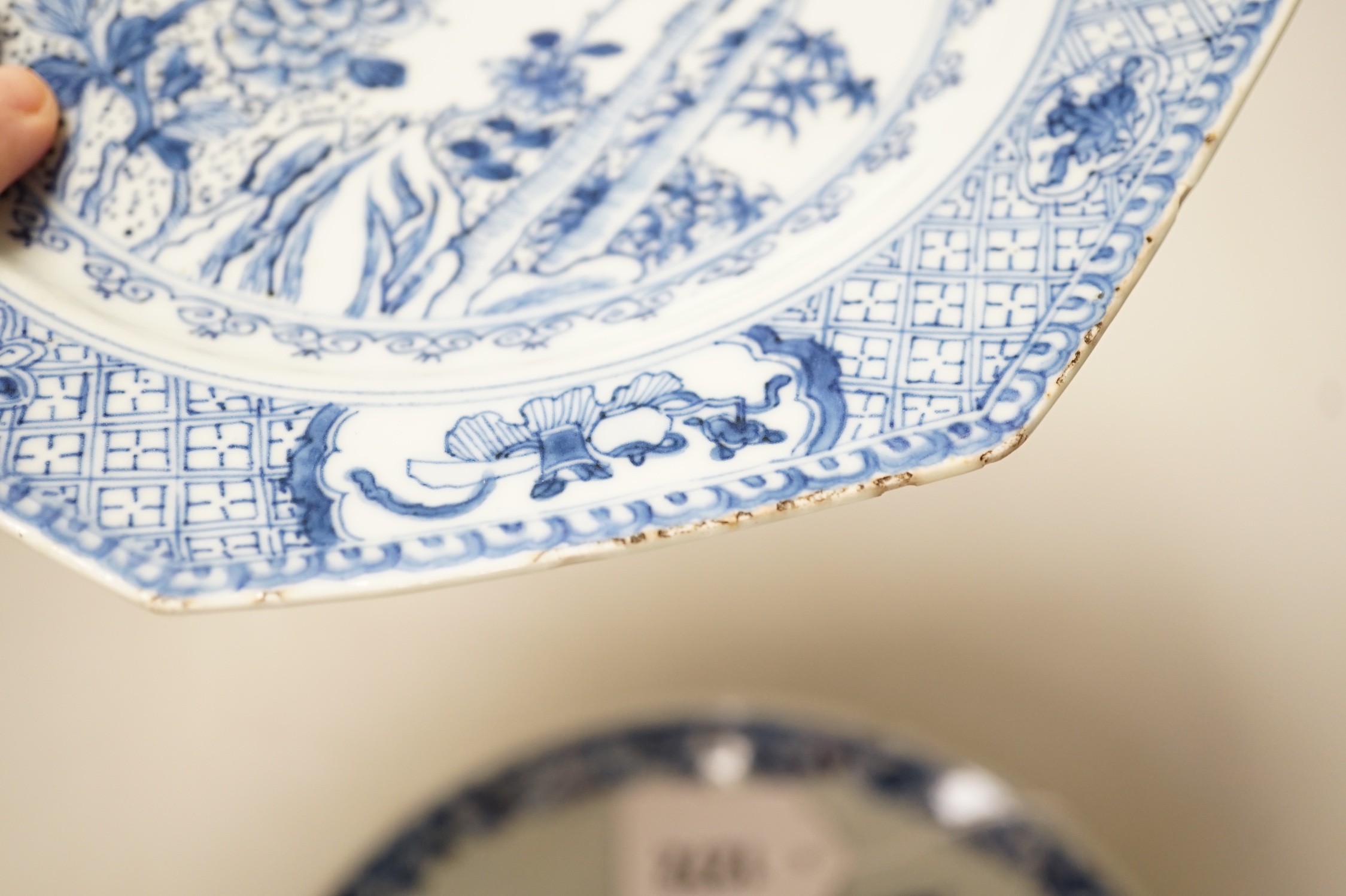 An 18th century Chinese Export octagonal plate and a similar saucer dish. 22.5cm diameter